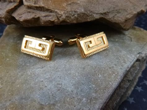 gemelos givenchy|GIVENCHY. GOLDEN CUFFLINKS. – NAMA VINTAGE.